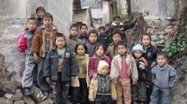 Мільйони дітей у Китаї змушені жити без батьків