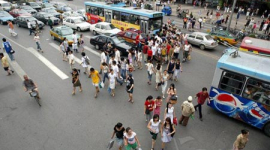 Фотоогляд: Безпорадні пішоходи в жвавих районах Пекіна