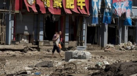 Наводнение на северо-востоке Китая, возможно, погубило несколько тысяч человек. Фото 