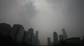За 11 дней до Олимпиады Пекин окутан смогом (фотообзор)