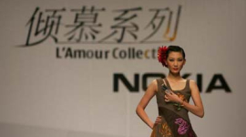 Фоторепортаж: щорічний Міжнародний тиждень моди у Китаї (день сьомий)