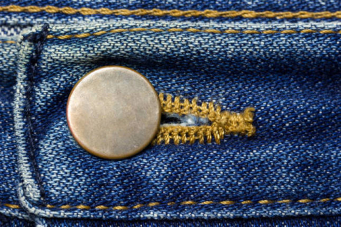 Як відрізнити чоловічі джинси від жіночих за ґудзиками?