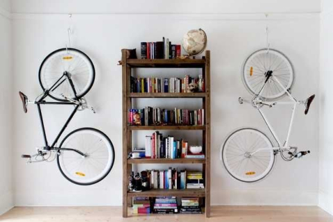Хранение велосипеда в доме: популярные виды креплений и систем