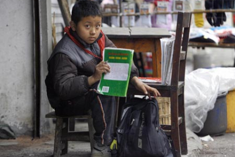 Китайська влада закриває школи для дітей з бідних сімей (фотоогляд)