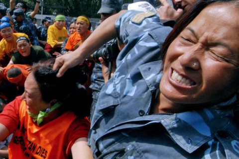 Полиция разогнала демонстрацию тибетских активистов (Фотообзор)