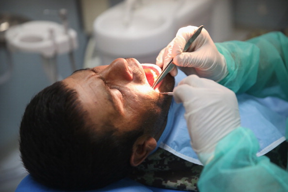 Удаление зуба 
